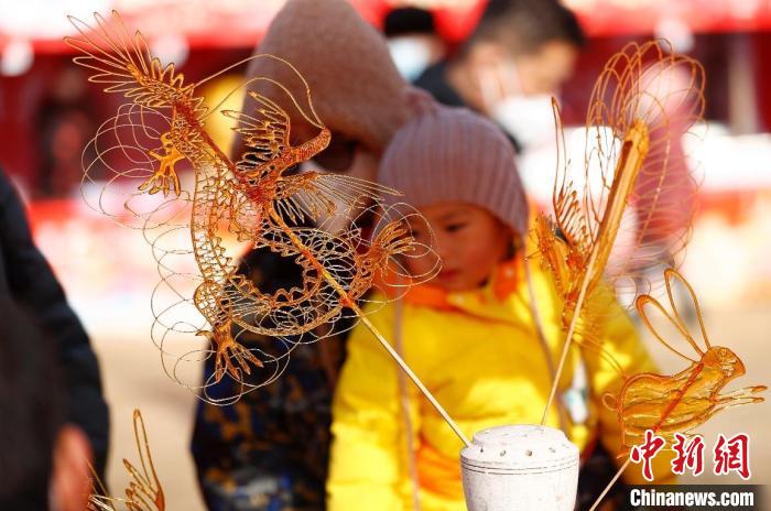 北京消費(fèi)季“2023——年花豐食大集”正月初一在北京世界花卉大觀園開市?！?lt;a target='_blank' href='/'>中新社</a>記者 富田 攝