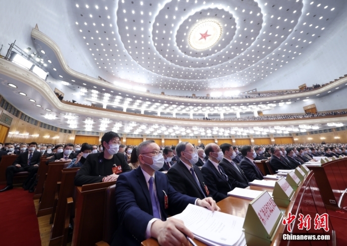 3月7日，十四屆全國人大一次會議在北京人民大會堂舉行第二次全體會議。<a target='_blank' href='/'>中新社</a>記者 盛佳鵬 攝